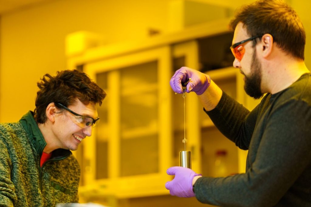 scientist stretching 3-D printed material