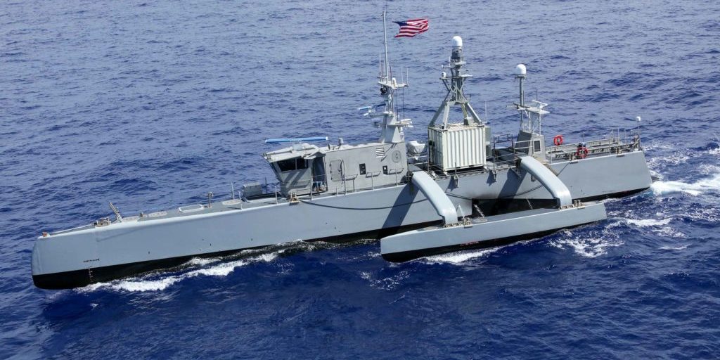 RIMPAC 2022 Fleet Sails in Formation Medium displacement unmanned surface vessel Sea Hunter sails in formation during Rim of the Pacific (RIMPAC), July 28, 2022. Twenty-six nations, 38 ships, three submarines, more than 30 unmanned systems, approximately 170 aircraft, and 25,000 personnel participated in RIMPAC from June 29 to Aug. 4 in and around the Hawaiian Islands and Southern California. The world’s largest international maritime exercise, RIMPAC provides a unique training opportunity while fostering and sustaining cooperative relationships among participants critical to ensuring the safety of sea lanes and security on the world’s oceans. RIMPAC 2022 is the 28th exercise in the series that began in 1971 (U.S. Navy photo by Mass Communication Specialist 3rd Class Aleksandr Freutel).