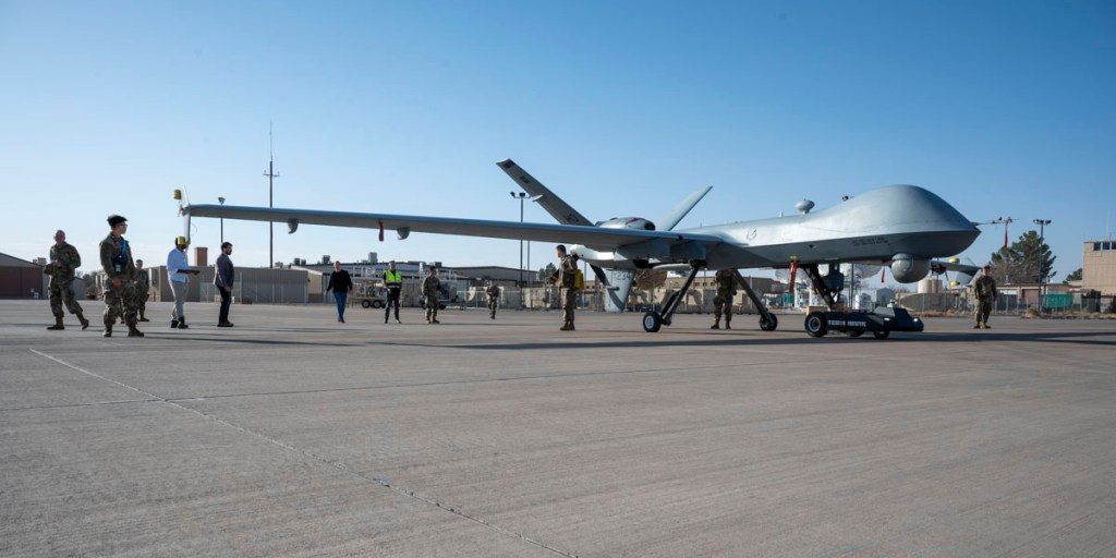 Members of Holloman, TowFLEXX Miltech and Evitado conduct an MQ-9 Reaper towing demonstration at Holloman Air Force Base, New Mexico, Feb. 27, 2025. The 49th Maintenance Group is enhancing mission readiness by partnering with Evitado Technologies and TowFLEXX Miltech to develop a cutting-edge anti-collision solution for aircraft towing, integrating sustainable, emissions-free technologies that align with the Department of Defense’s Green Procurement Program and improve operational safety. (U.S. Air Force photo by Senior Airman Isaiah Pedrazzini)