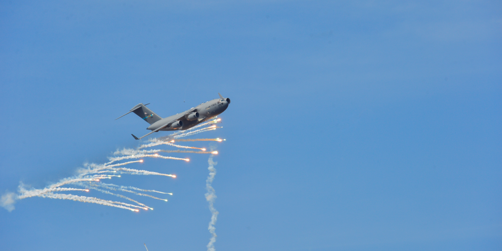 PNG160324-F-PT194-706 Department of Defense Aircraft deploying flares