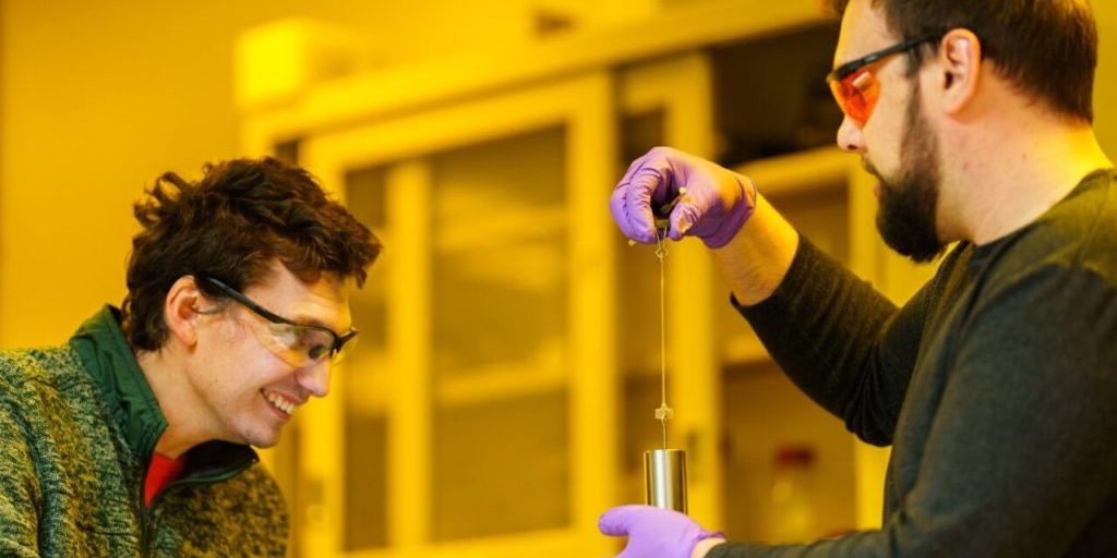 scientist stretching 3-D printed material